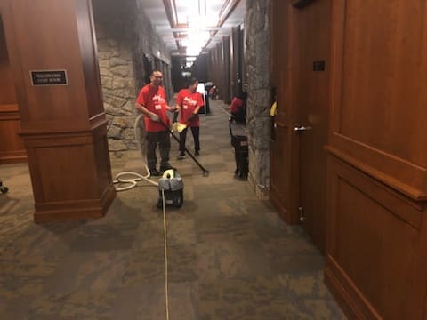 Vacuuming Carpet